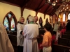 Rev. David Elliott greeting parishioners at St. Georges Episcopal Church in Clarksdale. 