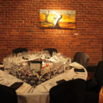 A table in the Dining Room at Madidi Restaurant for French Night Madidi. Photography by Langdon Clay