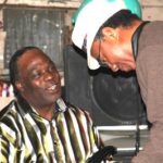 "Big T" Williams talkin' to Alphonso Sanders during the party at Red's Club. Photo by The Delta Bohemian