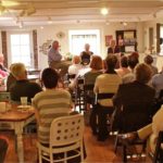 Author Curtis Wilkie talks to a crowd at TurnRow Book Company in Greenwood, MS. Photo by The Delta Bohemian