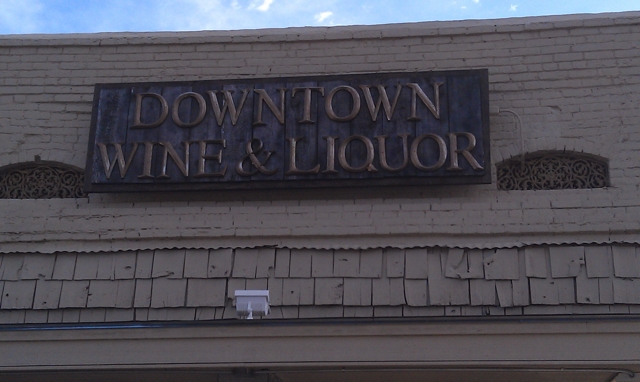 Downtown Wine and Liquor sign in Clarksdale. Photo and signage by Delta Debris.