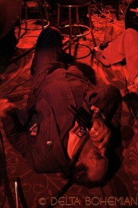 BIG GEORGE BROCK playing his harp on the floor of Red's Blues Lounge in Clarksdale. Photo by DELTA BOHEMIAN