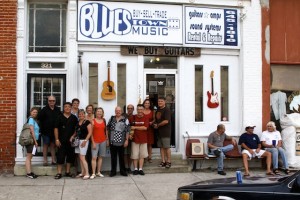 A group of French tourists in front of Bluestown, owned by Ronnie Drew, in Clarksdale. Ronnie is on the far right. Photo by DELTA BOHEMIAN