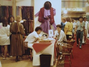 Founder of Putumayo Clothing and Putumayo World Music Dan Storper and Magical Madge Marley during a Boutique Show in New York City. Circa 1982.