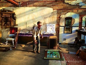 Artist Randall Andrews working on his installation at the NEW ROXY in Clarksdale