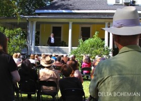 Actor Johnny McPhail performing on a porch during Tennessee Williams Festival in Clarksdale.