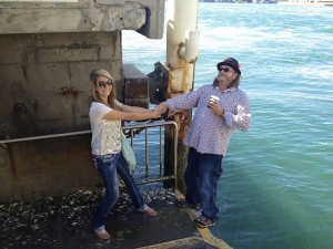 Bethany and her dad, Billy Poor William Howell almost in the harbor in Downtown Sydney. Photo by DELTA BOHEMIAN