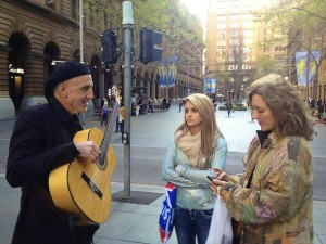 Madge Marley Howell and Bethany Howell meeting musician JOSE in Downtown Sydney. Photo by DELTA BOHEMIAN