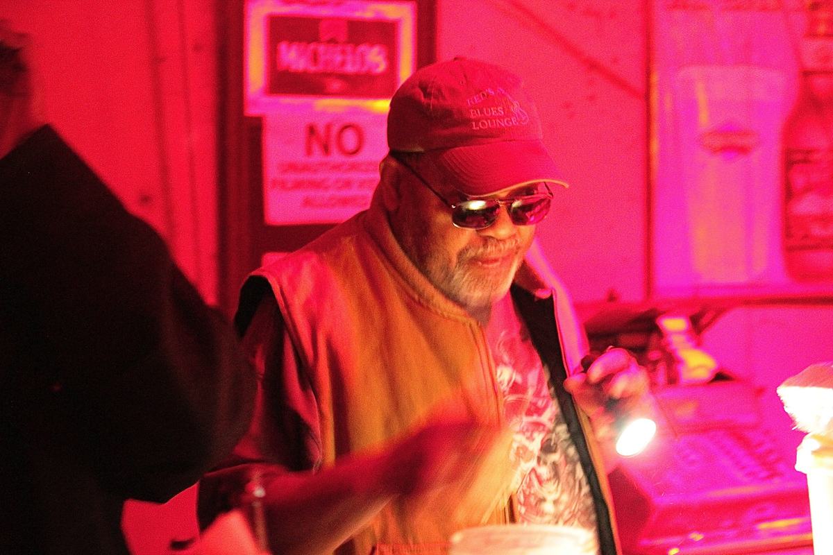 Red Paden using his flashlight at his Blues Club in Clarksdale. Photo by DELTA BOHEMIAN