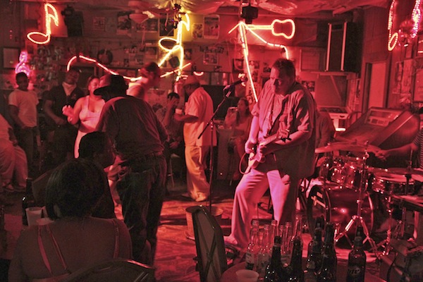 Lightnin' Malcolm with Pinetop Perkins making his way across the dance floor. Photo by DELTA BOHEMIAN