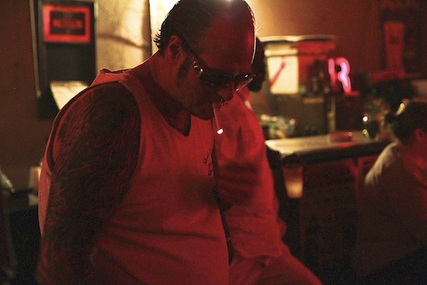 Clarksdale Semi-Fixture Aussie Matt Rock enjoying a smoke at Red's Blues Lounge. Photo by DELTA BOHEMIAN