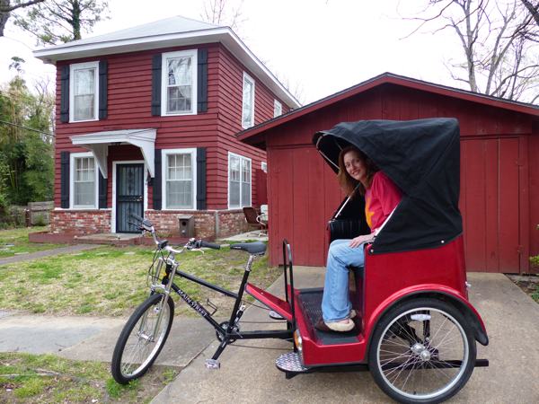 Magical Madge in front of the Delta Bohemian Guest House in the DB pedicab