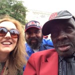 Three people smiling for a photo.