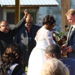 Wedding ceremony with guests and officiant.