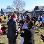 Wedding ceremony with guests and a couple.