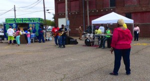 A band plays music at a food stand.