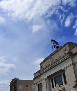 Bank of Clarksdale building with flags.