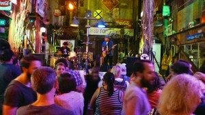 People enjoying live music in a bar.