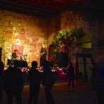 Live music performance in a brick building.