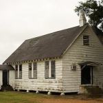 A small white church with a steeple.