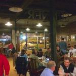 Group of people dining in a restaurant.