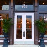 Bella Boutique storefront with double doors.