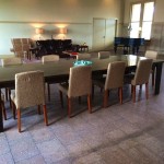 Empty dining room with a large table.