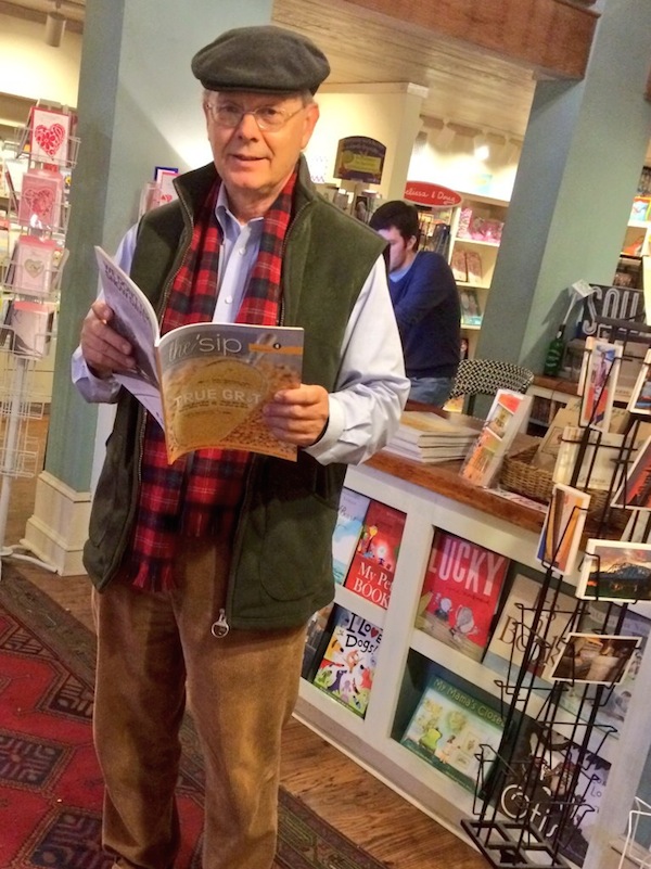 Greenwood native Bryan Lott holding the newest issue of The 'Sip at TurnRow Bookstore in Greenwood