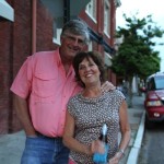 Smiling couple posing for a photo.