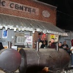 People gathered outside a music center.