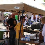 People at an outdoor food market.