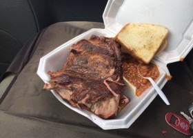 BBQ ribs, baked beans, and toast.