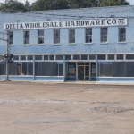 Blue building with "Delta Wholesale Hardware Co. Inc." sign.