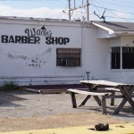 Wade's Barber Shop with picnic table outside.