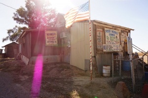 American flag flying over Poor Monkey Lounge.