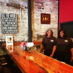 Two women at Bell's Inspired Brewing bar.