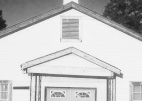 Black and white photo of a church building.