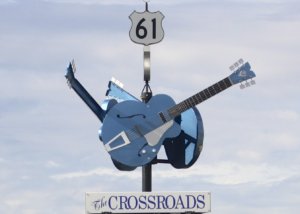 Blue guitar sculpture at Route 61 Crossroads.