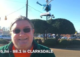 Man in sunglasses smiling in Clarksdale, MS.