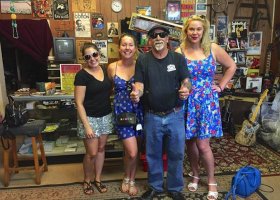 Stephanie Cummings, Jayme Erickson, Deak Harp and Karla Burke (bride) at his shop in Clarksdale after he gave them an impromptu performance