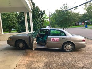 Cab Driver Roosevelt Noah's Jolly Cab arriving at the Clarksdale White House