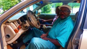 Clarksdale Taxi Cab Driver Roosevelt Noah waiting on his fare ride at the Clarksdale White House