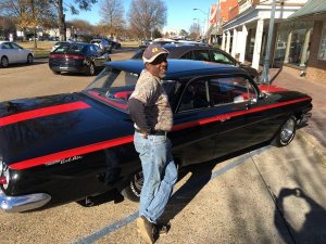 "Big J" Milton Johnson of Johnson Plumbing beside his refurbished 1961 Chevy Bel Air