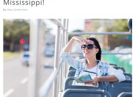 Woman on a sightseeing tour bus in Mississippi.