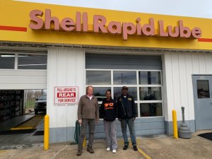 Shell Rapid Lube storefront with employees