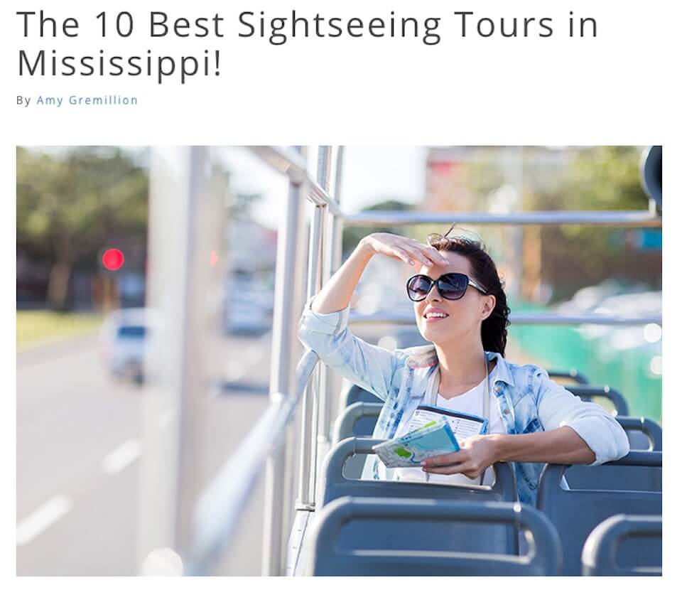 Woman enjoying sightseeing bus tour