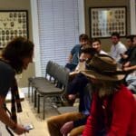 Group of people gathered in a room.
