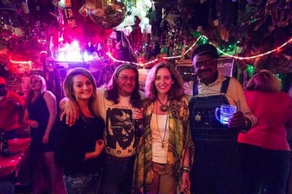 Friends enjoying a colorful night out