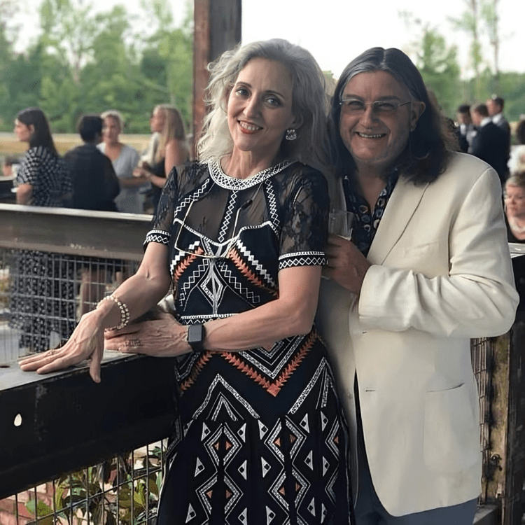 Elegant couple posing together outdoors