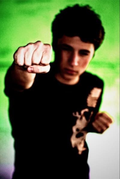Person striking a punch pose